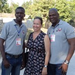 Anny Frederique flanked by librarians Odverne Charles and Besly Belizaire